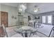 Spacious living room featuring ample seating, a fireplace, and large windows for natural light at 2025 Flamingo Way, Franklin, IN 46131