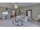 Open-concept living area combines a dining room, living room, and comfortable seating at 2025 Flamingo Way, Franklin, IN 46131