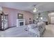 Spacious living area with a fireplace, dining area, and seamless flow for gatherings at 2025 Flamingo Way, Franklin, IN 46131
