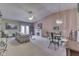 Spacious living room featuring ample seating, a fireplace, and large windows for natural light at 2025 Flamingo Way, Franklin, IN 46131