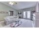 Bright living room with vaulted ceiling, floral sofa, and french doors for ample natural light at 2025 Flamingo Way, Franklin, IN 46131