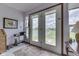 Sunlit room with beautiful views of the lush backyard and serene lake at 2025 Flamingo Way, Franklin, IN 46131