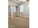 Bright bedroom featuring ample closet space, neutral walls and a window AC unit at 208 E Madison E St, Alexandria, IN 46001
