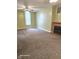 Cozy living room with neutral walls, carpet, ceiling fan and fireplace at 208 E Madison E St, Alexandria, IN 46001