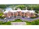 Beautiful aerial view of condo building near a lake with parking and green space at 20971 Shoreline Ct # 201, Noblesville, IN 46062