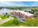 Aerial view of the apartment complex overlooking the water and surrounding landscape at 20971 Shoreline Ct # 201, Noblesville, IN 46062