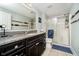 Bathroom featuring a granite countertop vanity, mirror, and glass-enclosed shower at 20971 Shoreline Ct # 201, Noblesville, IN 46062