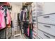 Organized walk-in closet featuring ample storage and shelving for clothes and accessories at 20971 Shoreline Ct # 201, Noblesville, IN 46062