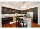 Kitchen with island seating, stainless steel appliances, and stylish pendant lighting at 20971 Shoreline Ct # 201, Noblesville, IN 46062
