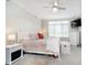 Serene main bedroom with a comfortable bed, a ceiling fan, and a window with natural light at 20971 Shoreline Ct # 201, Noblesville, IN 46062