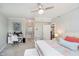 Bright main bedroom with a desk area, and a view into the en-suite bathroom at 20971 Shoreline Ct # 201, Noblesville, IN 46062