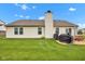 A beautiful backyard with a manicured lawn and patio area perfect for outdoor entertaining at 2163 Bradford Trace Blvd, Indianapolis, IN 46229