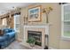 Stylish fireplace with decorative mantel and tile surround at 2163 Bradford Trace Blvd, Indianapolis, IN 46229