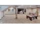 Finished basement with a play area, cozy decor, and ample space for entertainment at 246 Westchester Blvd, Noblesville, IN 46062