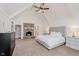 Spacious bedroom features a fireplace and vaulted ceiling at 246 Westchester Blvd, Noblesville, IN 46062