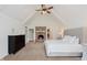 This bedroom features a fireplace and vaulted ceiling at 246 Westchester Blvd, Noblesville, IN 46062