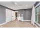 This spacious bedroom features neutral carpeting, a ceiling fan, and a large window with natural light at 246 Westchester Blvd, Noblesville, IN 46062