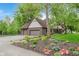 Beautiful home with a manicured lawn, landscaping, and a three-car garage at 246 Westchester Blvd, Noblesville, IN 46062