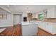Modern kitchen with stainless steel appliances, a center island, and stylish cabinetry at 246 Westchester Blvd, Noblesville, IN 46062