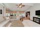 Cozy living room with a large sectional sofa, fireplace, and open layout at 246 Westchester Blvd, Noblesville, IN 46062