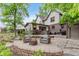 Outdoor brick patio area features comfortable seating and a cozy fire pit, perfect for relaxing and entertaining at 246 Westchester Blvd, Noblesville, IN 46062