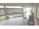 Relaxing back porch offering ample space for outdoor enjoyment and scenic views at 3107 N 100 W, Shelbyville, IN 46176
