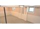 A finished basement featuring painted concrete floors, paneled walls, and windows at 3107 N 100 W, Shelbyville, IN 46176