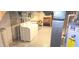 Unfinished basement with laundry area, water heater, and exposed HVAC ductwork at 3107 N 100 W, Shelbyville, IN 46176