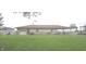 A full side view of the home shows the front yard and other structures at 3107 N 100 W, Shelbyville, IN 46176