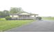 Charming single-story home featuring a welcoming front porch and well-maintained lawn at 3107 N 100 W, Shelbyville, IN 46176