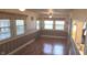 The living room features hardwood floors and large windows at 3107 N 100 W, Shelbyville, IN 46176