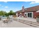 Multi-level back deck with a built-in hot tub, comfortable seating, and beautiful water views at 3403 Island Way, Indianapolis, IN 46214
