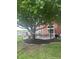 Relaxing backyard setting with a hammock hanging from a mature shade tree at 3403 Island Way, Indianapolis, IN 46214