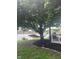 Backyard featuring a hammock hanging between a large tree near the water at 3403 Island Way, Indianapolis, IN 46214