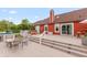 Backyard deck with an outdoor table, chairs and hot tub, ideal for entertaining or relaxing at 3403 Island Way, Indianapolis, IN 46214