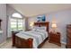 Cozy bedroom featuring a queen-sized bed, ample natural light, and tasteful decor at 3403 Island Way, Indianapolis, IN 46214