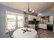 Cozy dining area featuring a breakfast nook, modern lighting, and a seamless transition to the kitchen at 3403 Island Way, Indianapolis, IN 46214
