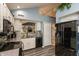 Bright kitchen features modern appliances, white cabinets, and a stylish backsplash design at 3403 Island Way, Indianapolis, IN 46214