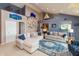 Inviting living room with vaulted ceilings, comfortable seating, and seamless transition to nearby rooms at 3403 Island Way, Indianapolis, IN 46214
