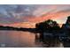 Beautiful sunset reflecting off the water on this lovely waterfront property at 3403 Island Way, Indianapolis, IN 46214