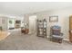 Cozy living room with carpet, traditional furniture, and an inviting atmosphere for relaxation at 3803 Churchman Woods Blvd, Indianapolis, IN 46203