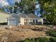 Charming single-story home with a two-car garage, stone accents and a well-maintained lawn in a quiet neighborhood at 3805 Windstar Way, Columbus, IN 47203