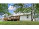 Backyard featuring a spacious wooden deck and lush lawn at 3916 Jekyll Ct, Indianapolis, IN 46237