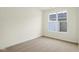 Bright bedroom with carpet and a large window view at 3927 Wren Dr, Brownsburg, IN 46112