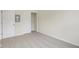 Bright bedroom with a closet, carpet, and open doorway at 3927 Wren Dr, Brownsburg, IN 46112