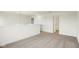 Open loft area with carpet, white railing, and natural lighting at 3927 Wren Dr, Brownsburg, IN 46112