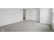 Spacious bedroom with neutral carpet and closet at 3947 Wren Dr, Brownsburg, IN 46112