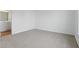 Clean carpeted bedroom featuring an adjacent bathroom and a neutral paint scheme at 3947 Wren Dr, Brownsburg, IN 46112
