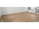 Spacious living area featuring hardwood floors and bright white walls at 3947 Wren Dr, Brownsburg, IN 46112