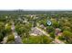 An aerial view of the property with the city skyline in the background shows the neighborhood's convenient location at 4040 Carrollton Ave, Indianapolis, IN 46205